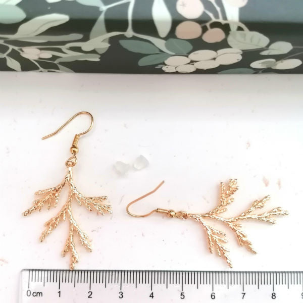 longues boucles d'oreilles chics